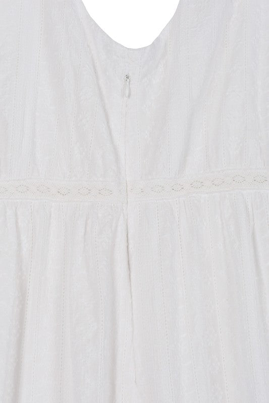 Ellie Embroidered white V neckline tiered dress